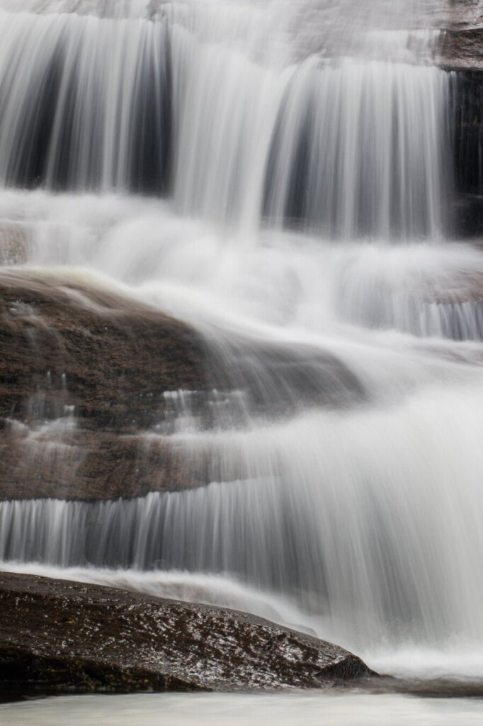 Water, falling over rocks.