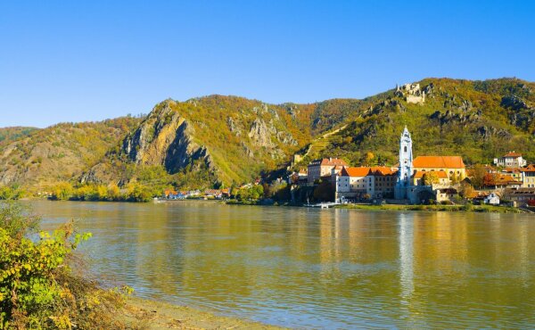 View of the city dürnstein in the wachau from the other side of the danube in late autumn