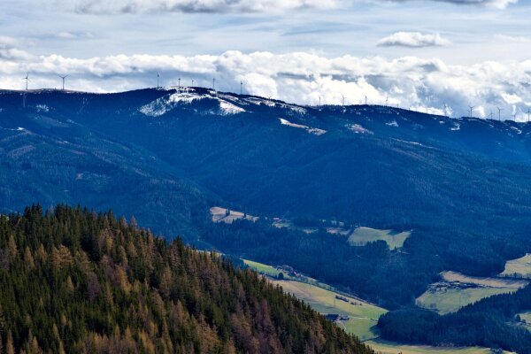 Wind wheels on the mountain tops near mürzzuschlag, styria, seen from the way to the grosse scheibe